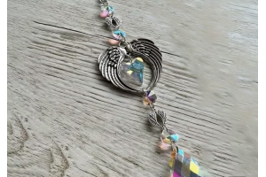 Attrape soleil « ailes d’ange argentées »